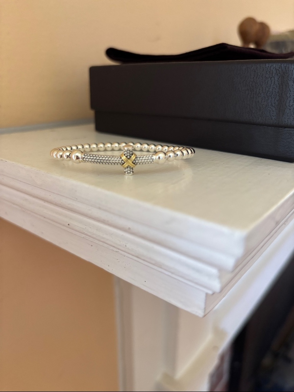 LAGOS sterling silver and 18K caviar cross stretch bracelet, size 6.